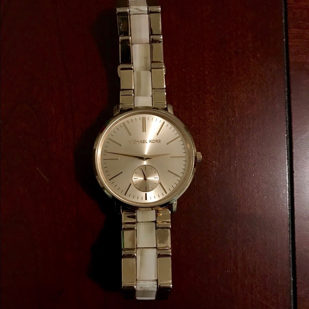 Gold Michael Kors watch (women’s)